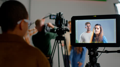 Unhappy-Female-Actor-Ending-Scene-Shooting-Movie-Or-Video-In-Film-Studio-Viewed-On-Monitor